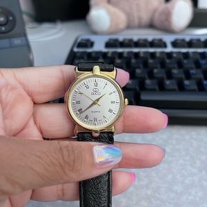Vintage Gucci watch in gold and black